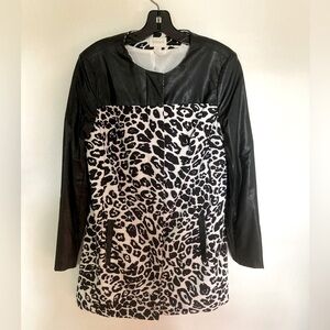 Black and white leather trimmed coat.